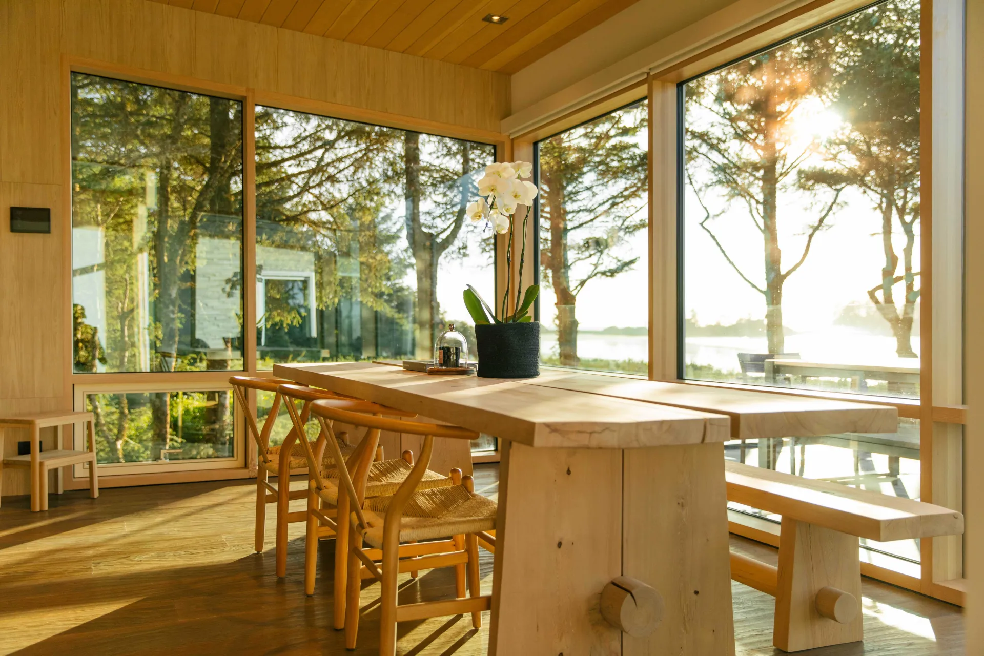 Tofino-beach-house-curtain-wall-timber-windows-raico-dinning-area