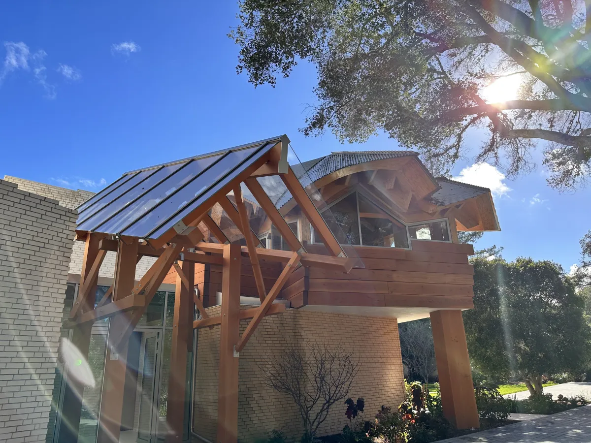 California residence exterior glass entry canopy